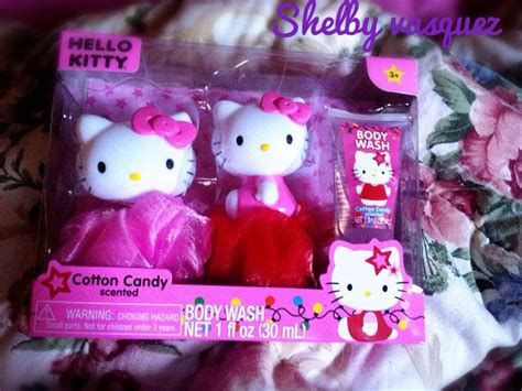 Two Hello Kitty Dolls In Pink And Red Dresses