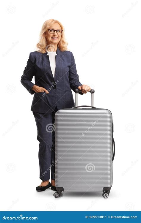 Full Length Portrait Of A Mature Woman Standing With A Suitcase Stock