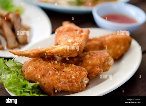 Fried Chicken Wings On Dish Stock Photo Alamy