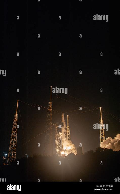 The Spacex Falcon 9 Rocket Blasts Off Carrying The Dragon Commercial