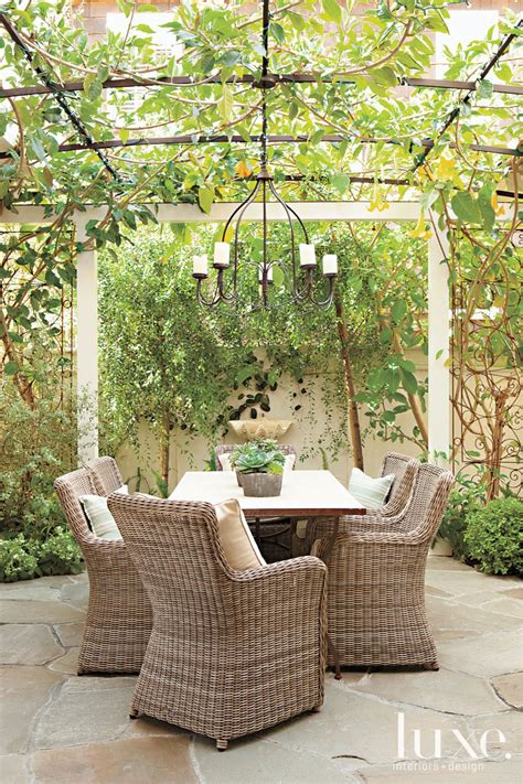 neutral contemporary outdoor dining area luxe interiors design