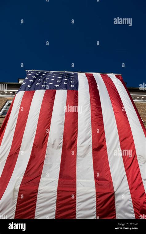 American flag on building Stock Photo - Alamy