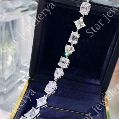 Multi Shape Colorless Moissanite Tennis Bracelet Pear Emerald Oval