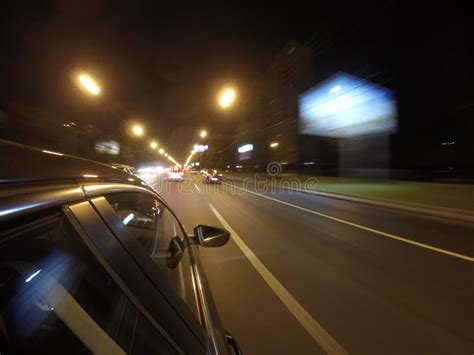 The Car is Moving at High Speed on the Night Road in the City. Stock Photo - Image of cabin ...