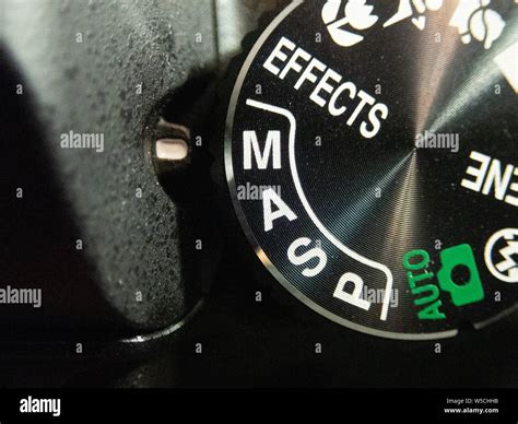 Macro Of A Nikon Dslr Camera Mode Dial Turned On Manual Mode Stock