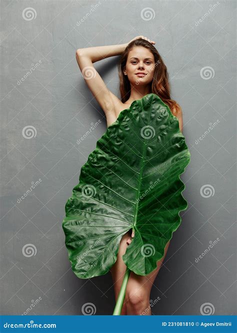 Woman With Naked Body Hiding Behind Large Green Leaf Stock Photo Image Of Large Modern 231081810