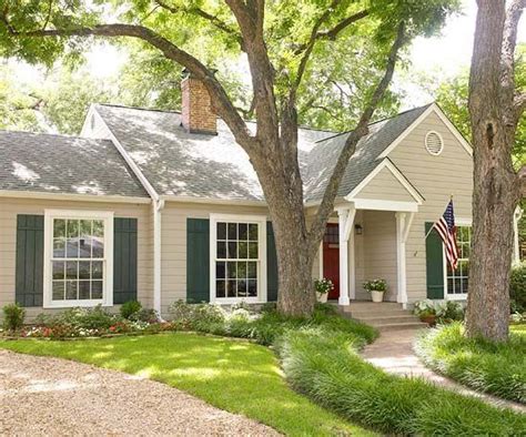 Tan Siding With Wood Shutters A Perfect Match For Your Homes Exterior