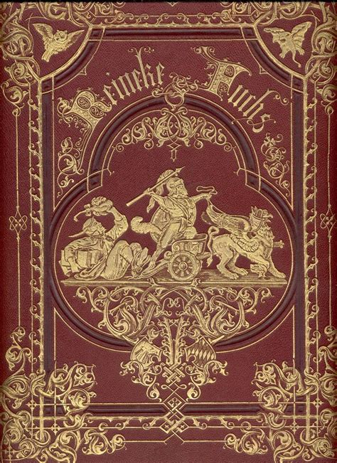 An Old Book With Gold Trimming And Ornate Design On The Cover In Red