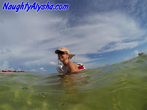 Big Titted Amateur Lounges On An Air Mattress While Naked In A Ball Cap Nakedpics