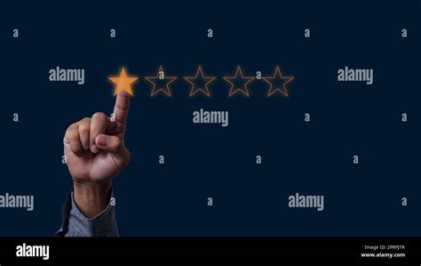 Businessman Hand Touches Five Stars Rating Feedback Rating And Positive