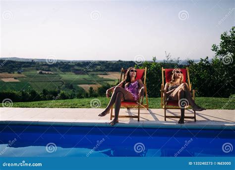 Women Relaxing And Sunbathing In Summer Stock Image Image Of Sunbathe