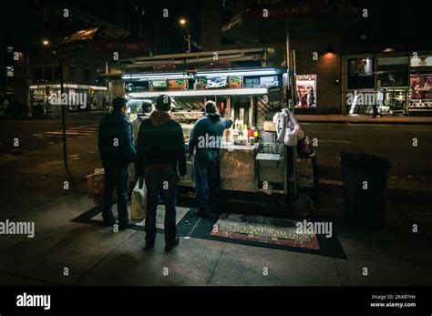 Two Men Wait To Be Served At Adel S Famous 6th Ave Halal Food In New