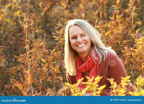 Happy Mature Woman In Evening Sunlight In Autumn Stock Image Image Of