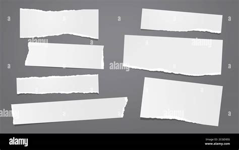 Set Of Torn White Note Notebook Paper Pieces Stuck On Dark Grey