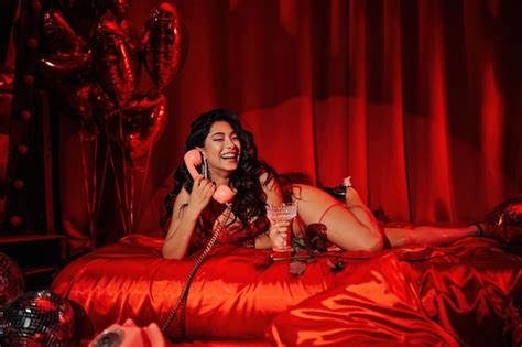 Premium Photo Portrait Of Smile Sexy Asian Girl Glam Makeup In Red Lace Lingerie Lying On Bed