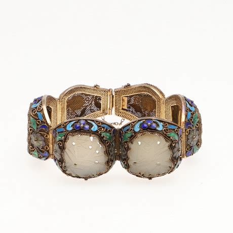 A CHINESE SILVER GILT JADE AND ENAMEL BRACELET Jewellery Gemstones