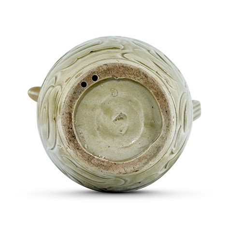 A Yaozhou Celadon Carved Floral Ewer Northern Song Dynasty