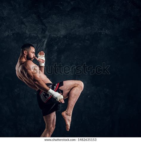 Muscular Handsome Fighter Naked Torso Demonstraiting Stock Photo