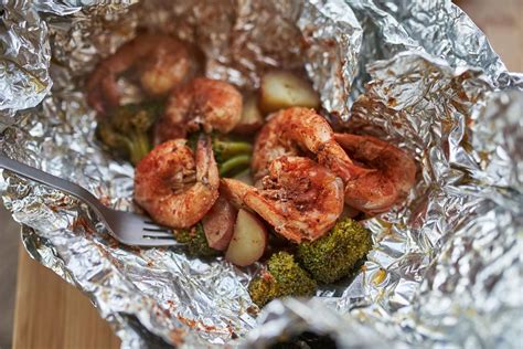 Cajun Shrimp Foil Packets With Broccoli And Potatoes Amanda Outside