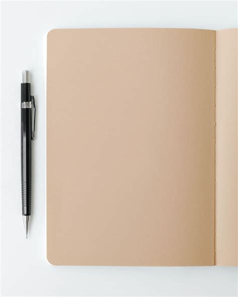 Blank Plain Brown Notebook Page With A Pencil Mockup Free Image By