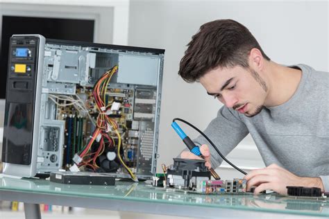 Computer Technician At Work