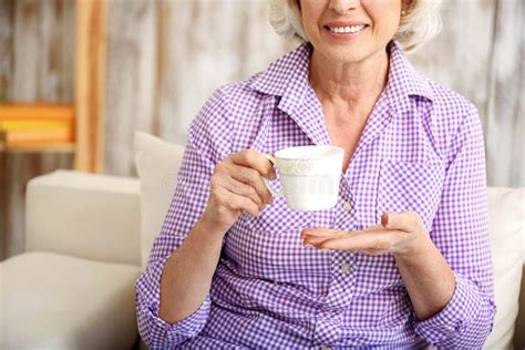 Happy Old Lady Drinking Hot Beverage At Home Stock Image Image Of