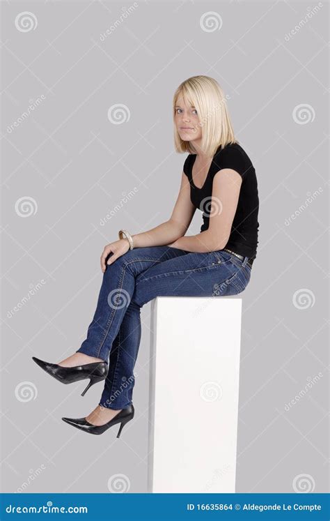 Young Blond Woman Sitting On A Cube Stock Photo Image Of Caucasian