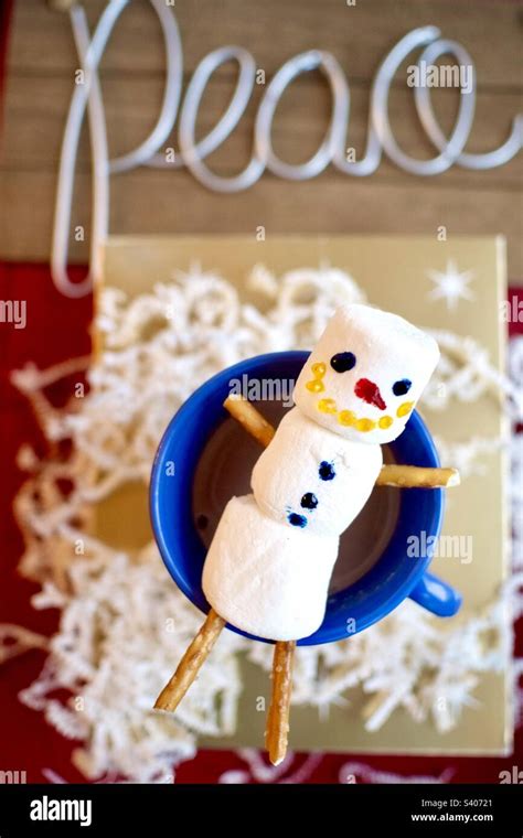 Marshmallow Snowman Floating Over Hot Chocolate Mug Festive Holiday