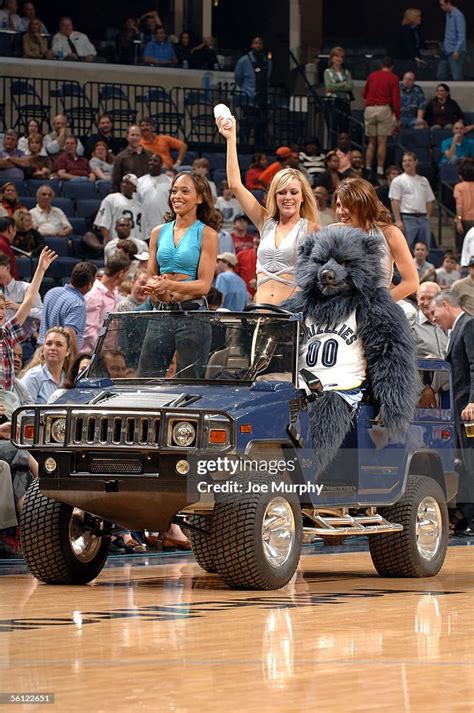 Grizz And Members Of The Memphis Grizzlies Dance Team Throw T Shirts