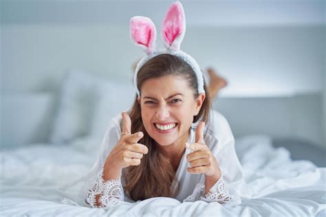 Premium Photo Nice And Sexy Brunette On Bed With Bunny Ears