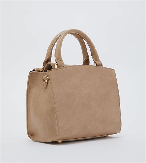 Buy Eeazid Arm Bag Small In Nude Thstreet Bahrain