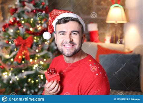 One Gorgeous Man Holding Christmas T Stock Image Image Of Alone Model 201899225