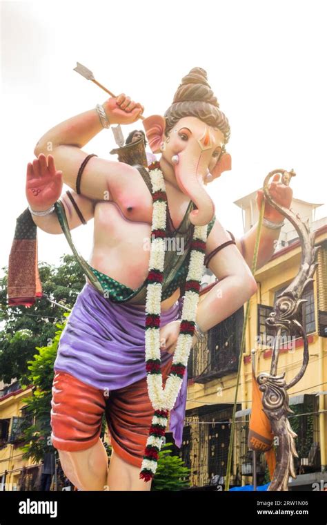 A Beautiful Idol Of Lord Ganpati Being Displayed In A Procession Called