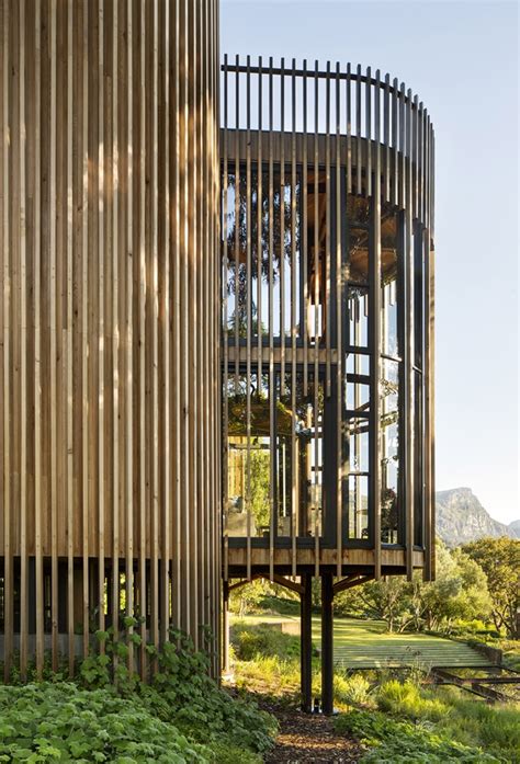 This contemporary treehouse-inspired cabin is a playful composition ...