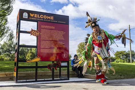 See Saginaw Chippewa Indian Tribe Perform Powwow Dance At Indigenous