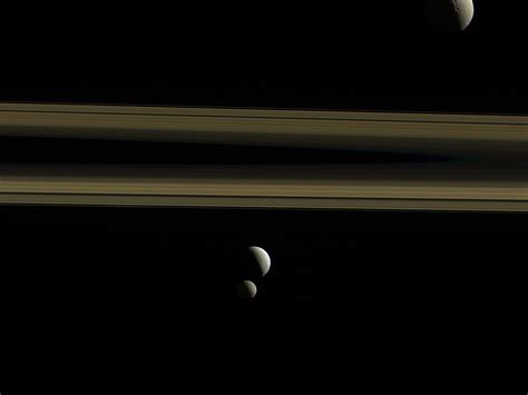 Esa Tethys Enceladus Mimas And Saturns Rings