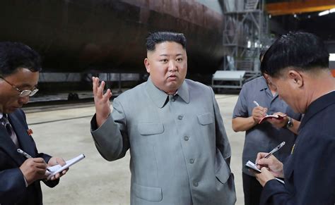 North Korean Leader Kim Jong Un Inspects New Submarine That Could