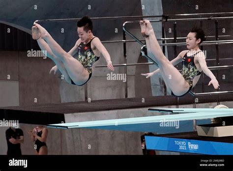 Chang Yani Right And Chen Yiwen Left Of China Perform A Dive During