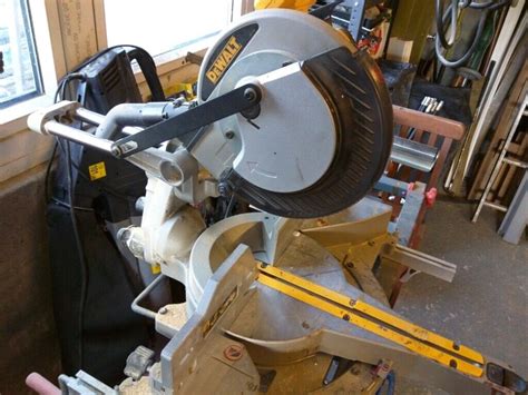 Dewalt Dw712 Slide Compound Mitre Saw 110240 Volt With Bench In