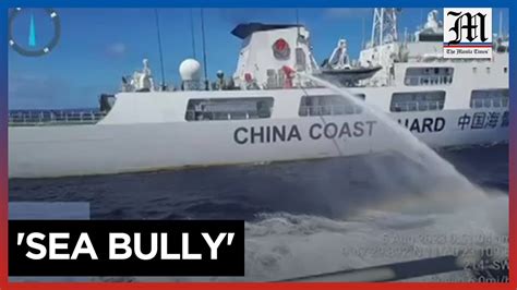 China Coast Guard Fires Water Cannon At Philippine Boat Youtube