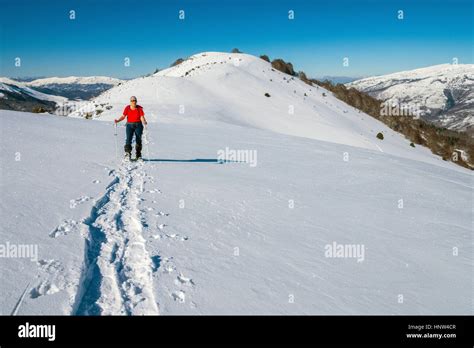 Female Figure Snowshoeing Plateau De Beille French Pyrenees Stock