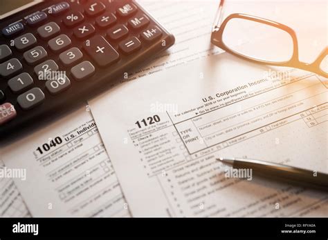 Us Individual Income Tax Return Tax Form 1040 With Eyeglasses And