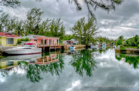 Reflections On The Canal At Coral Harbour Town In Nassau The Bahamas By Jeremy Lavender