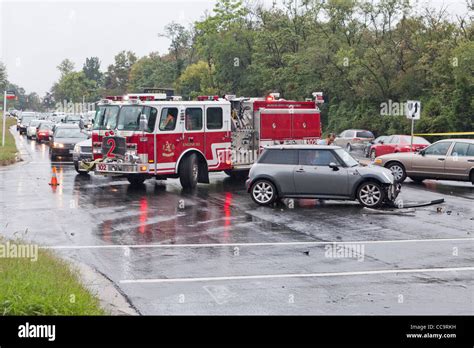 A firetruck responding to an accident scene - USA Stock Photo - Alamy