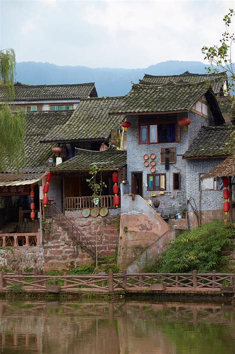 "Chinese Village By The River" by Stocksy Contributor "Bo Bo" - Stocksy