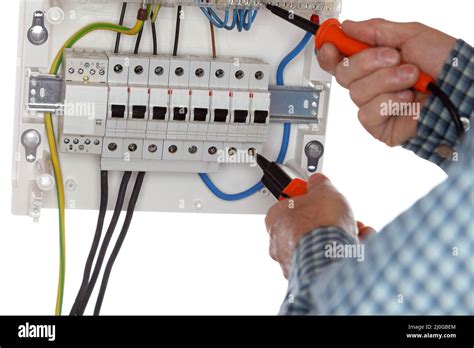 Working On Electrical Device Stock Photo Alamy
