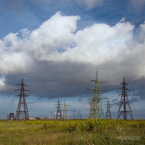 Powerful Lines Of Electric Gears Power Lines And Sky With Clouds Wires