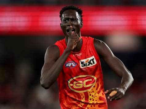 Afl 2024 Gold Coast Suns Attempts To Try And Fend Off Four Victorian