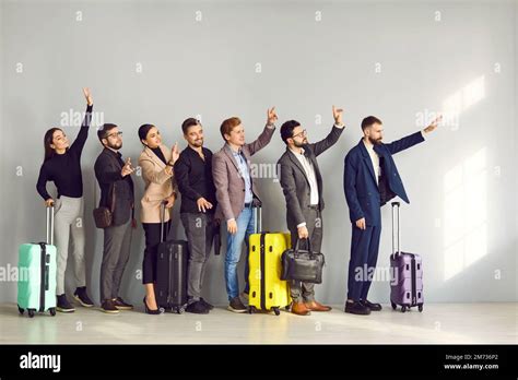 Group Of People Standing At The Airport Waving Hands Saying Goodbye