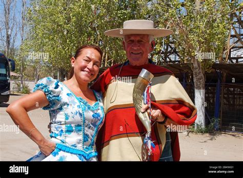 Male Tourist In Chilean Cowboy Poncho And Hat Hi Res Stock Photography